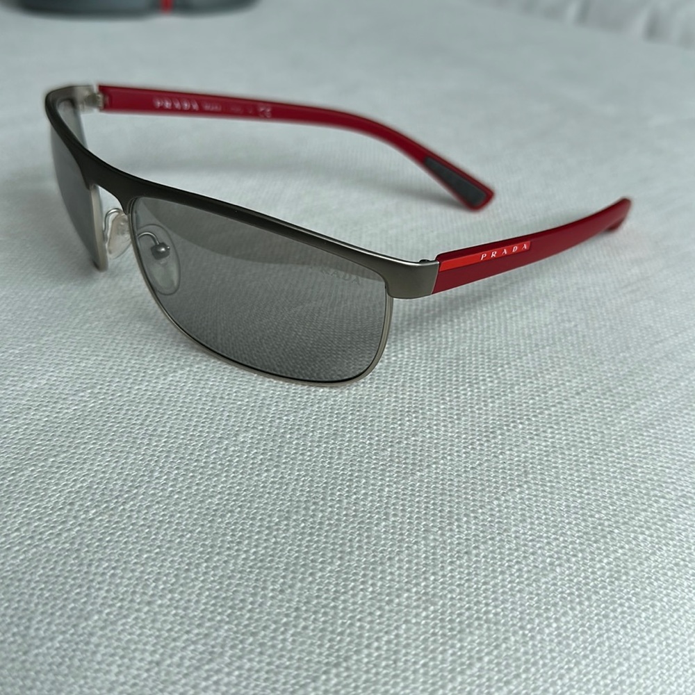 Prada Sunglasses - silver frame with red arms